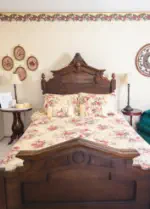 queen bed in victorian themed weekend escape