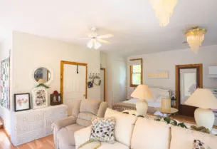 open layout suite with living room and mini kitchen