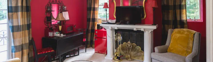 richly decorated vacation rental with mini fridge, microwave and tv