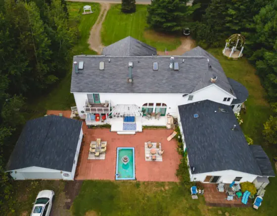 aerial view of ivory mansion from back of house