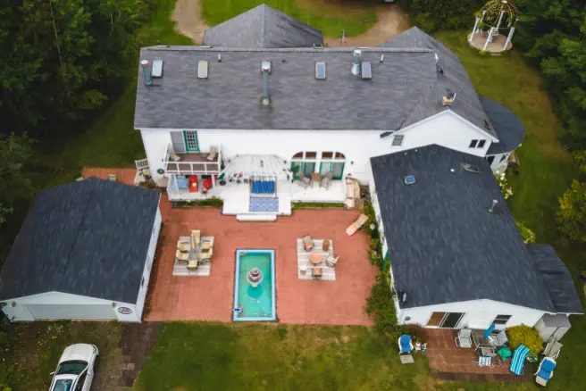 aerial view of ivory mansion from back of house