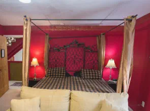 fancy bad in richly decorated room