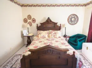 queen bed in victorian themed weekend escape